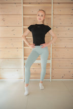 Eng anliegendes nahtloses Kurzarm-Trainingsshirt